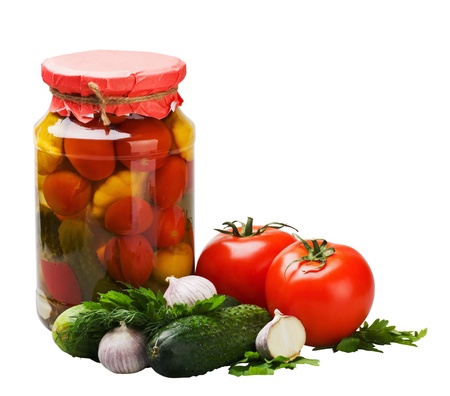 fresh and canned vegetables with spices and herbs isolated on white backgroundの写真素材