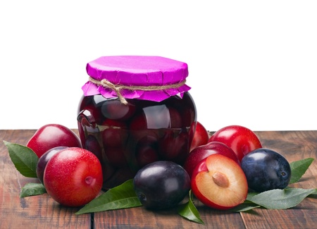 ripe, fresh and canned plum isolated on white background の写真素材