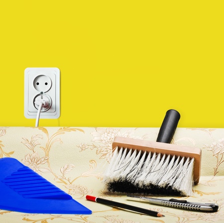 taping of the yellow wallpaper and tools for repair
の写真素材