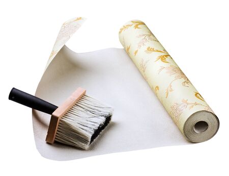 wallpaper and brush sticking isolated on white backgroundの写真素材