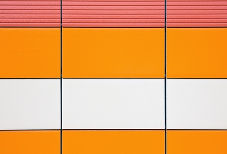 orange and beige tiles for cladding exterior surfaces, texture and colorの写真素材