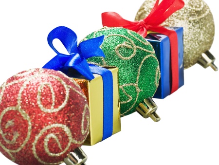 Christmas balls and gifts isolated on white backgroundの写真素材