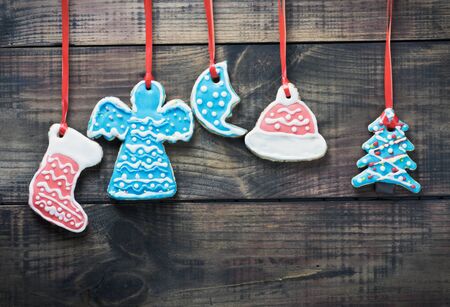colorful christmas gingerbread on wooden backgroundの写真素材