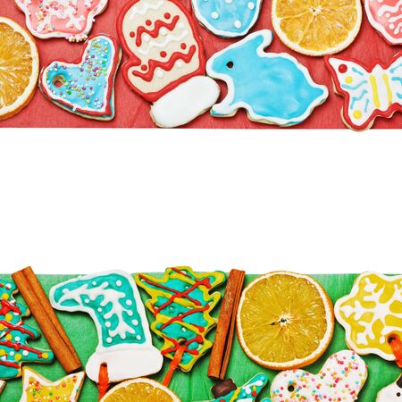 Christmas gingerbread on a red and green background with space for textの写真素材