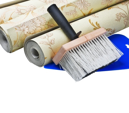 wallpaper and brush sticking isolated on white backgroundの写真素材