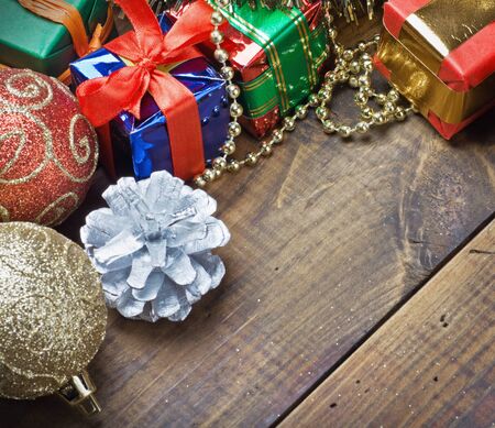 Christmas decorations, balloons and gifts on the tableの写真素材