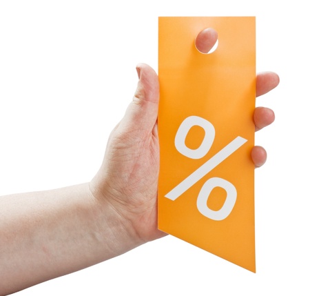 hand holding a card for discounts isolated on white backgroundの写真素材
