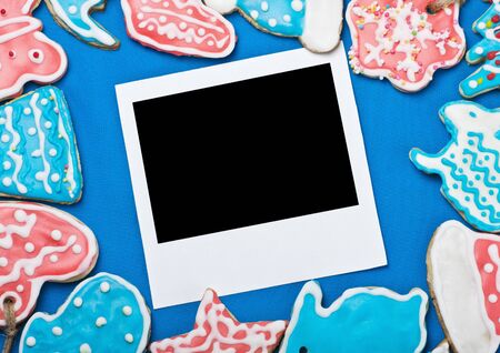 photo frames on the background of Christmas gingerbread homemade の写真素材