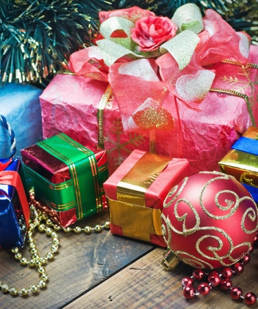 Christmas decorations, balloons and gifts on the table の写真素材