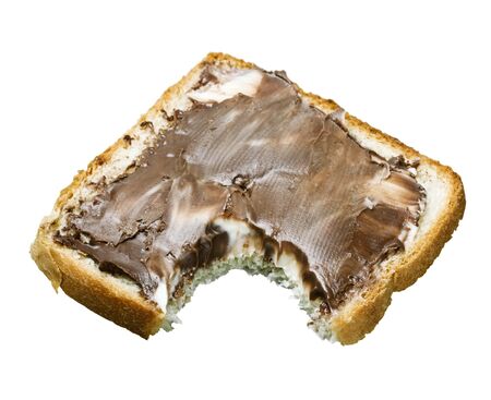 bitten slice of chocolate sandwich isolated on white backgroundの写真素材