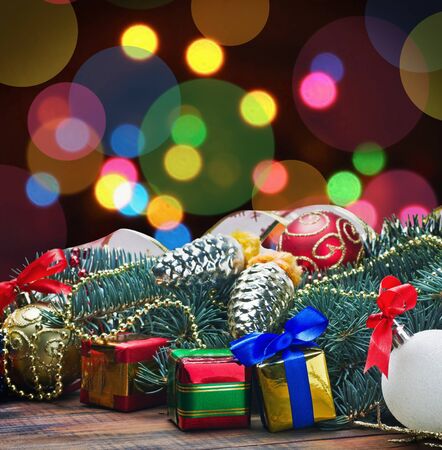 Christmas toys and decorations on a background garlandsの写真素材