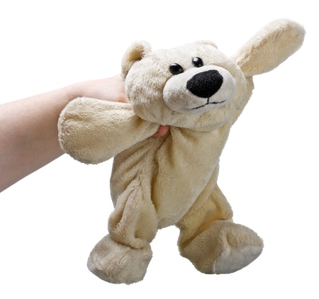 teddy bear in her hand isolated on white backgroundの写真素材