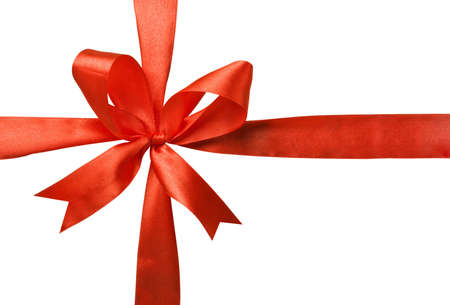 knitted bow of red ribbon isolated on white backgroundの写真素材