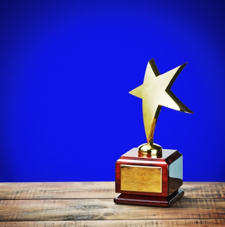 star award with space for text on a blue backgroundの写真素材