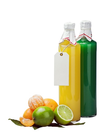 bottle with the juice of citrus fruits and blank label isolated on white backgroundの写真素材