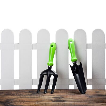 tools for working in the garden on the porch of a house isolatedの写真素材