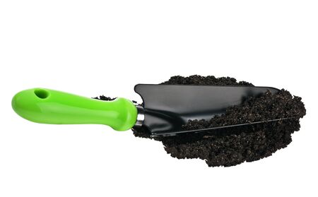 garden spade in the ground isolated on white backgroundの写真素材