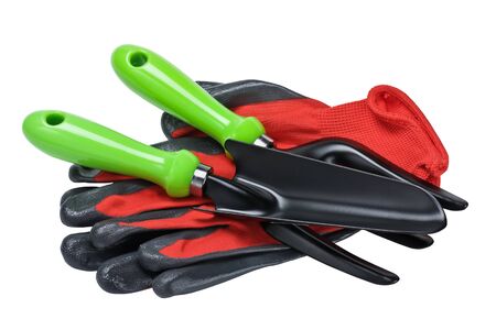 garden tools and red gloves isolated on white backgroundの写真素材