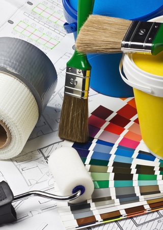 tools and accessories for home renovation on an architectural drawingの写真素材