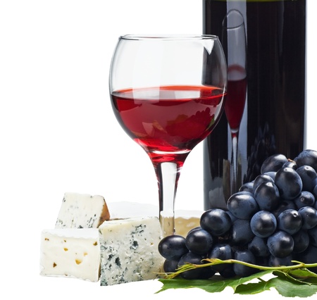 glass of red wine with grapes isolated on white backgroundの写真素材