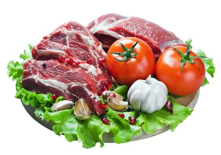 fresh pieces of steak and vegetables for grillingの写真素材