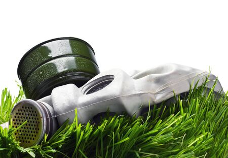 old gas mask on the Grass isolated on white backgroundの写真素材