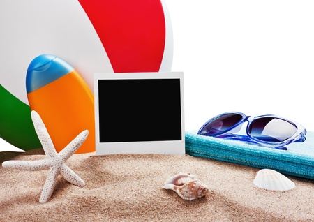 photoframe, towel and sunglasses and other accessories for the beachの写真素材
