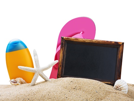 blackboard on the sand and other things for the beach isolated on white backgroundの写真素材