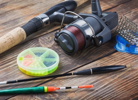 fishing tackle on a wooden table の写真素材