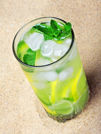 refreshing mojito cocktail on the sea sand の写真素材