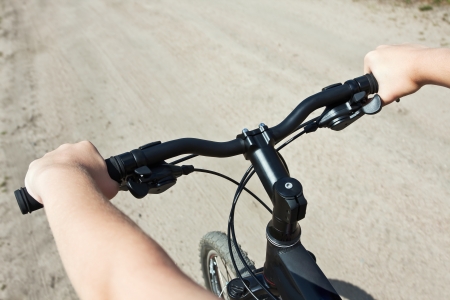 cycling with the speed. Focus on the handlebars.の写真素材