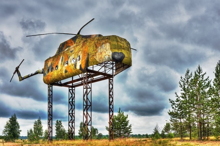 layout of the fuselage of an old Russian helicopter on military range. Created with HDRの写真素材