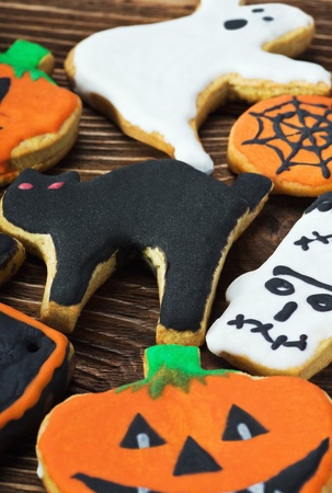 Handmade Halloween cookies on a wooden tableの写真素材