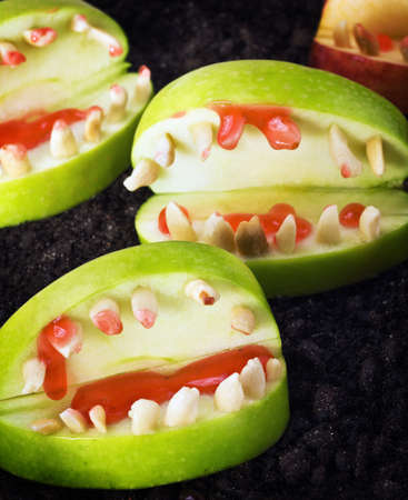 jaw with teeth of apples and nuts for Halloweenの写真素材