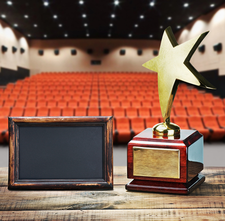 Star award for service to the background of the auditorium and the black board for the textの写真素材