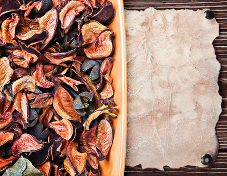 dry flowers in shades of orange and old paper for the labelの写真素材