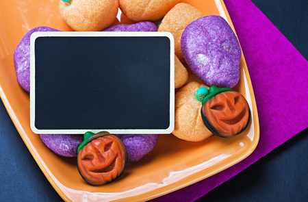 For Halloween candy and blackboard for writing greetingsの写真素材