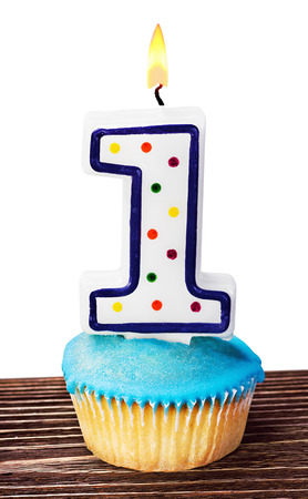 celebration of the first year either for a birthday isolated on whiteの写真素材