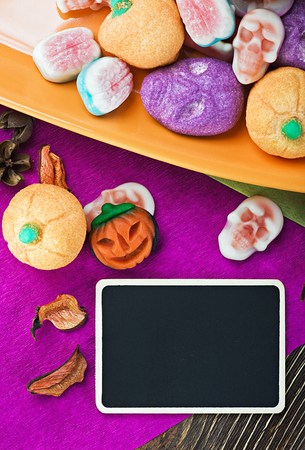sweets and candies for Halloween and blackboardの写真素材