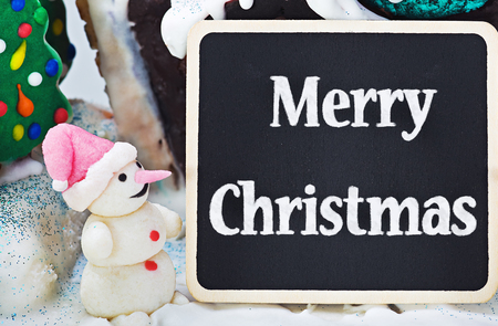 sweet decorations made of gingerbread and candy and greeting Merry Christmasの写真素材