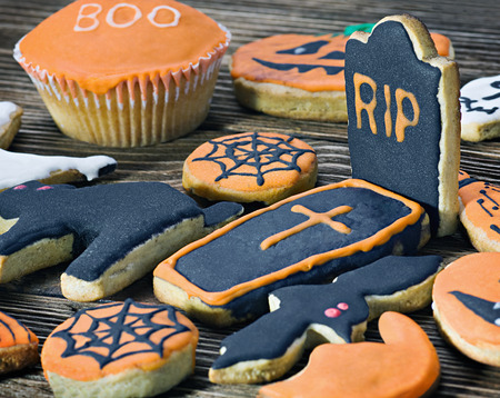 Handmade Halloween cookies on a wooden backgroundの写真素材