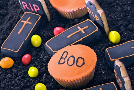 Homemade Halloween cookies and a selection of sweets for the holidayの写真素材