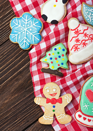smiling on the Christmas gingerbread decorations for the holidayの写真素材