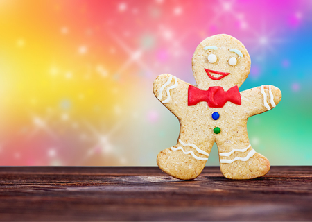 Smiling gingerbread men on a colored の写真素材