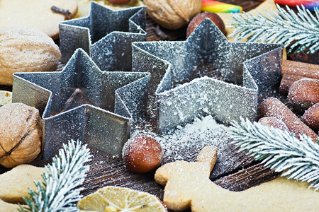 making Christmas cookies, bakeware and nutsの写真素材