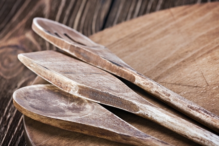Wooden kitchen utensils. Focus on the bottom of the frame, shallow depth of fieldの写真素材