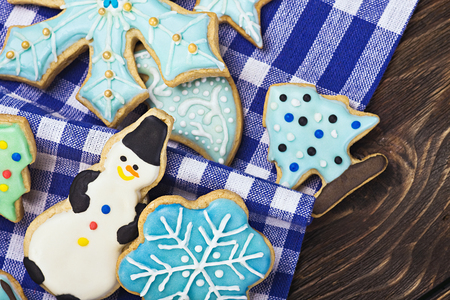 Smiling gingerbread men and Christmas cookiesの写真素材