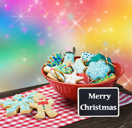 Christmas gingerbread cookies on a plate on the tableの写真素材