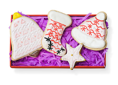 Christmas gingerbread cookies in gift box isolated on whiteの写真素材