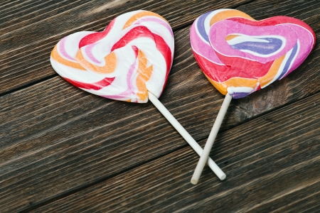large lollipop in form of heart on the tableの写真素材
